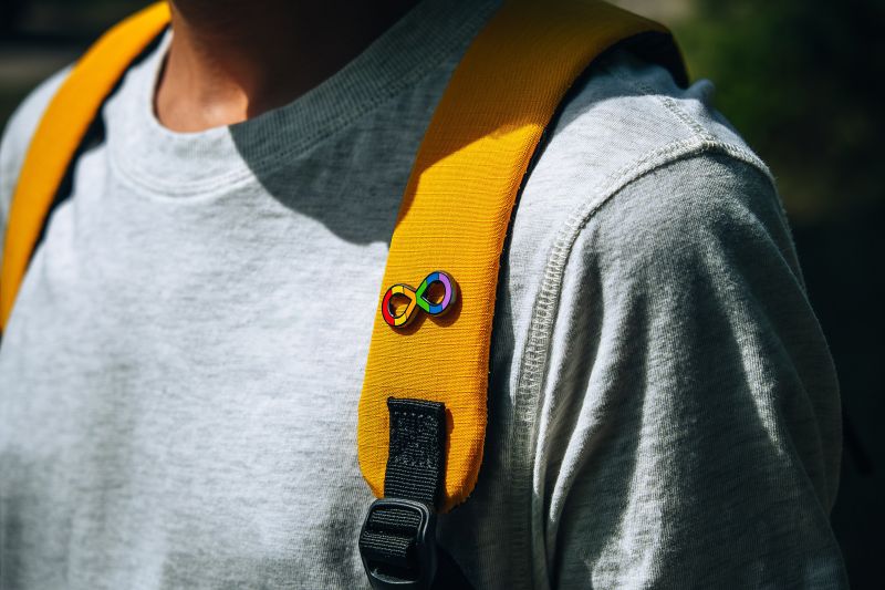 Kid,With,Backpack,With,Autism,Infinity,Rainbow,Symbol,Sign.,World