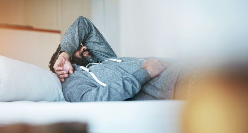 Tired,,Sleep,And,Man,In,Bed,With,Stress,,Burnout,And